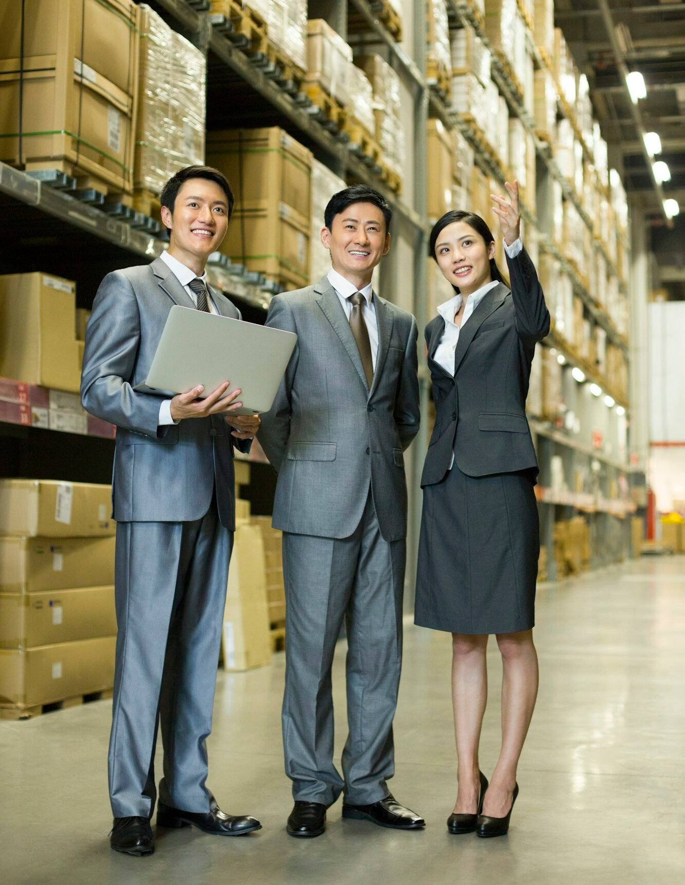 Business team in logistic warehouse